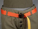 orange web belt with yellow reverse