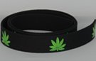 marijuana leaf print on black webbing strap
