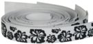 black flower print on white webbing strap